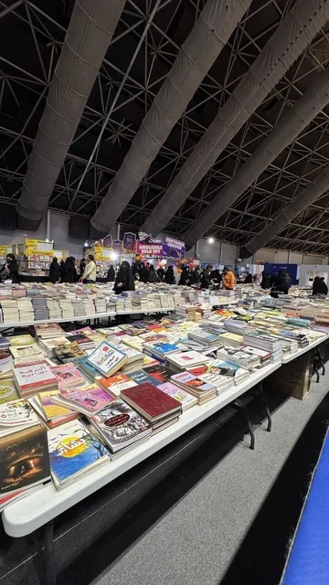 A collection of educational books and novels inside the International Book Fair in Jeddah on December 16, 2025, where visitors from various age groups interacted with famous cultural landmarks and tourist attractions, exhibitions of the Kingdom of Saudi Arabia, attracting and drawing tourists from around the world, and events of the Riyadh Season.