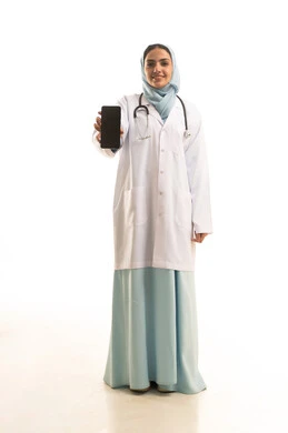 A blank black screen displayed on a mobile phone, medical services and applications via phone, meeting the demands of remote healthcare using modern technologies, a portrait of an Arab Gulf Saudi female doctor wearing an abaya and a medical coat, holding a stethoscope and a mobile phone, full-body shot, white background.