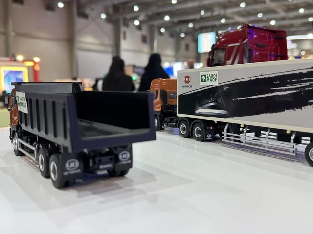 Saudi manufacturing transport trucks at the "Made in Saudi Arabia 2025" exhibition, a prominent industrial event aimed at enhancing Saudi national services, showcasing the quality and diversity of national industries and their innovations. The exhibition carries the slogan "We Empower Manufacturing," organized by the Saudi Export Development Authority, 2025 at the Riyadh Exhibition Center.
