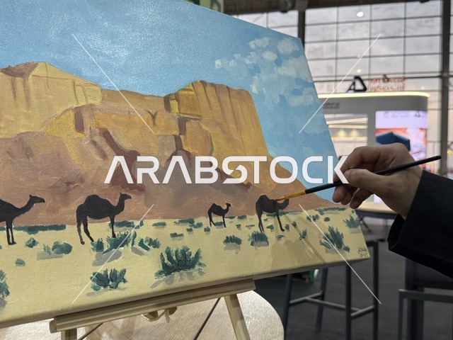 رسم صحراء وجمال في معرض "صُنع في السعودية 2025"،  حدث صناعي بارز يهدف إلى تعزيزالخدمات الوطنية السعودية، إبراز جودة وتنوع الصناعات الوطنية وابتكاراتها،  يحمل المعرض شعار "نصنع التمكين"، هيئة تنمية الصادرات السعودية، 2025 في مركز الرياض للمعارض