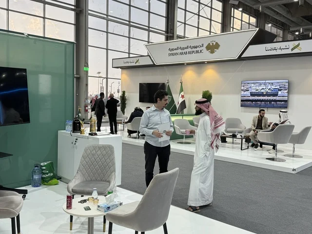 A pavilion for Syrian businessmen at the "Made in Saudi Arabia 2025" exhibition, a prominent industrial event aimed at enhancing Saudi national services, showcasing the quality and diversity of national industries and their innovations. The exhibition carries the slogan "We Empower Manufacturing," organized by the Saudi Export Development Authority, 2025 at the Riyadh Exhibition Center.