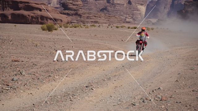 Youth recreational activities, World Championship for desert rallies, Dakar Rally event in Saudi Arabia, trails on sand dunes, dune bashing on soft sand in the desert, four-wheel drive truck, off-road motorcycle sports.