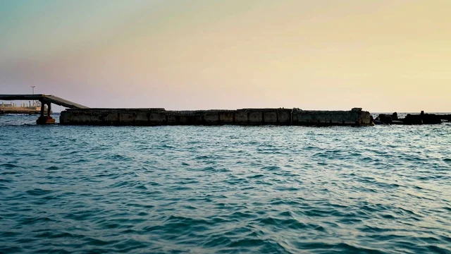 Tourist recreational places, Jeddah Sea on Jeddah Beach, Jeddah's tourist attractions, a view of the Jeddah Corniche at sunset, the Red Sea beach in the city of Jeddah in the Kingdom of Saudi Arabia, tourism in Saudi Arabia, Jeddah's waterfront and the tranquility and beauty of the sea.