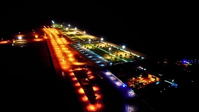 Architectural engineering artworks amidst the marine nature, famous coastal tourist spots in the Kingdom of Saudi Arabia, an aerial view of a lit seaside corniche at night in the Kingdom of Saudi Arabia, areas for recreational marine trips and tours, attracting and drawing tourists from all over the world.