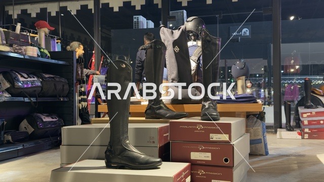 Equestrian riding tools, exhibits of equestrian supplies, World Volunteer Day 2025 at the King Abdulaziz Center for World Culture (Ithra), Saudi Arabia, raising public awareness about the importance of volunteer work in social development.