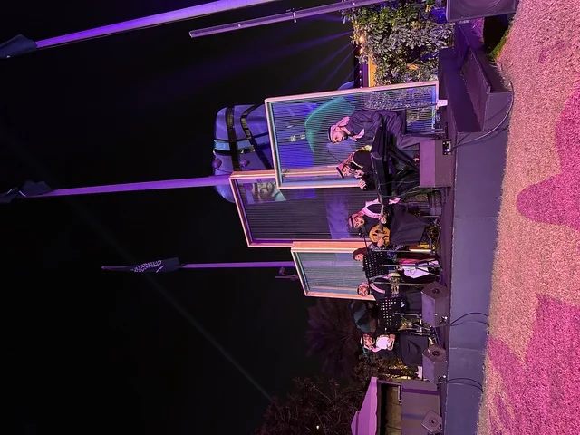 The Gulf music band at the events of the Wonders Hills Festival 2025 in the city of Jubail Industrial in the Eastern Province, operating outdoor theater platforms during nighttime events, coordinating sound and lighting equipment, theatrical performances in open spaces.