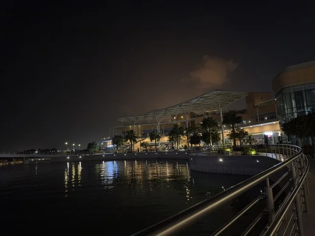 A promenade in The Move complex in Jubail Industrial City in the Eastern Province, a complete shopping and entertainment experience, a modern entertainment destination for the Jubail Corniche, cafes and restaurants for families and youth, a vibrant atmosphere for the year 2025.