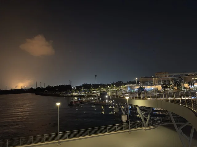 A promenade in The Move complex in Jubail Industrial City in the Eastern Province, a complete shopping and entertainment experience, a modern entertainment destination for the Jubail Corniche, cafes and restaurants for families and youth, a vibrant atmosphere for the year 2025.