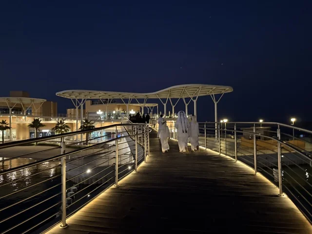 A promenade in The Move complex in the city of Jubail Industrial in the Eastern Province, a complete entertainment and commercial landmark, cafes and restaurants for families and youth, a modern entertainment destination for the Jubail Corniche, a vibrant atmosphere for the year 2025.