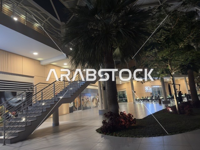 The elevator stairs in The Move complex in Jubail Industrial City in the Eastern Province, a complete entertainment and commercial landmark, a modern entertainment destination for the Jubail Corniche, cafes and restaurants for families and youth, a vibrant atmosphere for the year 2025.