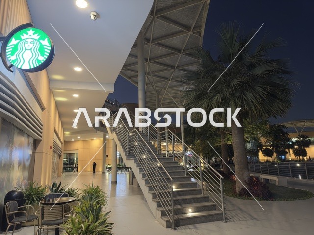 The elevator stairs in The Move complex in Jubail Industrial City in the Eastern Province, a complete entertainment and commercial landmark, a modern entertainment destination for the Jubail Corniche, cafes and restaurants for families and youth, a vibrant atmosphere for the year 2025.