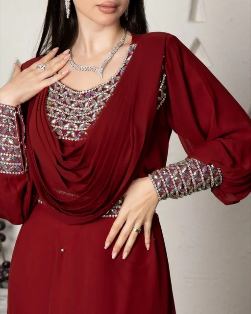 Jewelry and ornaments made of silver and diamonds, wearing a modern women's outfit, a Saudi Gulf Arab woman wearing an embroidered abaya, beauty, elegance, and attention to external appearance.