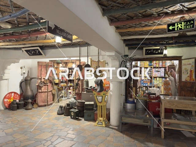 Village Store, the arrow on the exit sign points to the left, a rural or historical environment, preserving and showcasing local heritage to visitors, the traditional popular village is a prominent museum and restaurant located on the Corniche of Dammam in the Kingdom of Saudi Arabia.