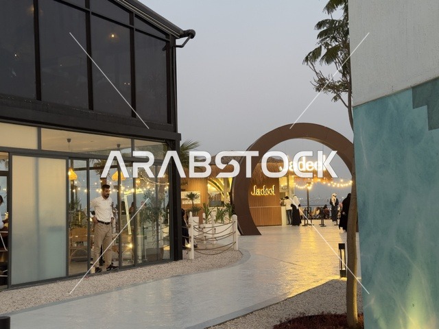 Entrance to Jadil Café at Bahar Takiya in the Eastern Province of Dammam on December 24, 2025, Kingdom of Saudi Arabia, various entertainment shows and activities, a marine tourism and entertainment destination, distinctive family atmosphere, upscale restaurants and cafes.