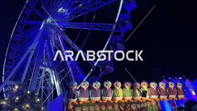 لعبة العجلة الدوارة العملاقة في ونتر وندرلاند جدة في حي الشاطئ بالقرب من الكورنيش على طريق الملك عبدالعزيز، وجهة ترفيهية شتوية كبرى، فعالية موسم جدة 2025 ، مهرجان هايد بارك الشتوي الرائع من 14 نوفمبر 2025 إلى 1 يناير 2026