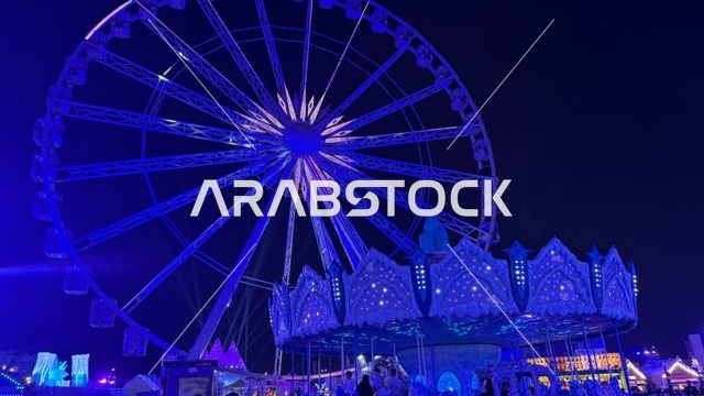 لعبة العجلة الدوارة العملاقة في ونتر وندرلاند جدة في حي الشاطئ بالقرب من الكورنيش على طريق الملك عبدالعزيز، وجهة ترفيهية شتوية كبرى، فعالية موسم جدة 2025 ، مهرجان هايد بارك الشتوي الرائع من 14 نوفمبر 2025 إلى 1 يناير 2026