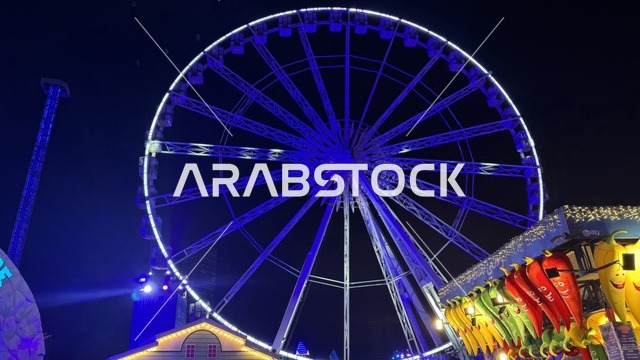 العجلة الدوارة العملاقة في ونتر وندرلاند جدة في حي الشاطئ بالقرب من الكورنيش على طريق الملك عبدالعزيز، مهرجان هايد بارك الشتوي من 14 نوفمبر 2025 إلى 1 يناير 2026، فعالية موسم جدة 2025 ،  وجهة ترفيهية شتوية كبرى