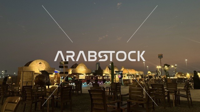 جلسة هادئة في الهواء الطلق، بلدة ساوث ويست (الكاوبوي) في حي الزهراء على طريق الملك عبد العزيز في مدينة جدة لعام 2025، مباني على الطراز الكلاسيكي الغربي، وجهة ترفيهية سياحية، مكان لقضاء وقت ممتع في المملكة العربية السعودية، ارتداء زي الكاوبوي الامريكية