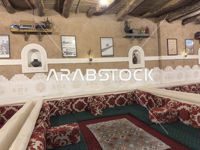 Interior design that reflects Arab heritage, this type of place is called "Majlis." The village is designed to reflect the traditional architecture of the region, a rural or historical environment. The popular heritage village is a prominent museum and restaurant located on the Corniche of Dammam in the Kingdom of Saudi Arabia.