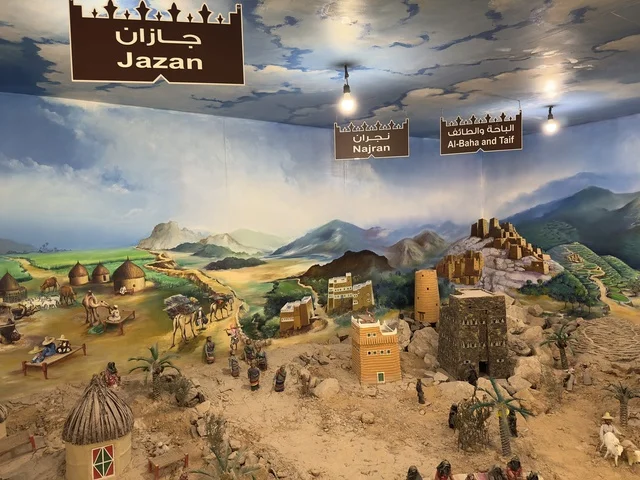A colored picture of the Jazan region in the past at the heritage village on the Corniche of Dammam, a cultural and tourist landmark that combines heritage, restaurants, and cafes, a place to spend enjoyable time with family in the Kingdom of Saudi Arabia.