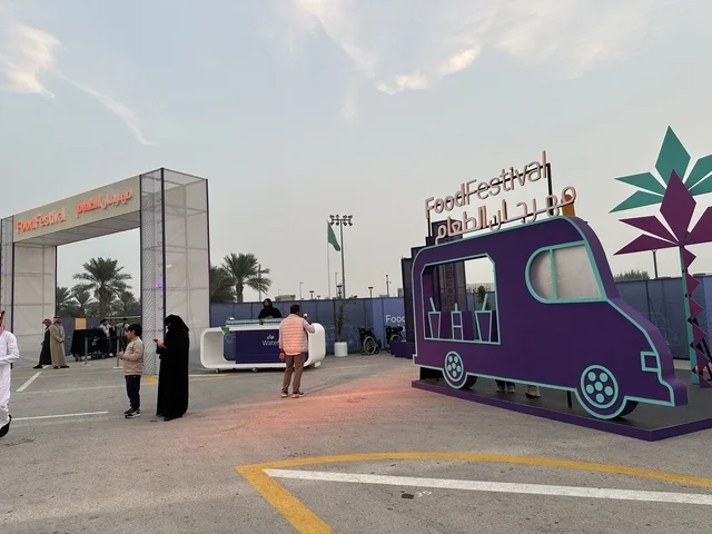 Entrance to a food festival at the Ithra outdoor gardens in Dhahran, Eastern Province, Saudi Arabia, on December 28, 2025. Family-friendly and entertaining atmosphere, famous restaurants and live cooking shows, an entertaining and educational experience, diverse global flavors, enjoyable outdoor seating.
