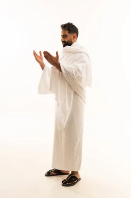 Supplication to Allah Almighty, expressions of intercession and seeking mercy, asking for help from the Lord Almighty, the concept of striving in worship, a portrait of a Saudi Arabian Gulf man wearing Ihram clothing raising his hands in gestures of prayer, performing the rituals of Hajj and Umrah, full-body image, white background.
