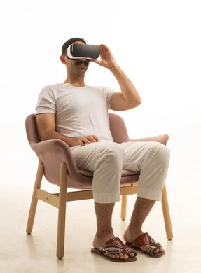 Saudi Man Wearing VR Headset in White Studio