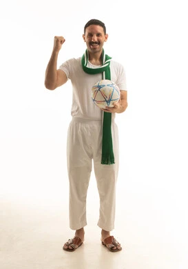 Saudi Football Fan Celebrating with Soccer Ball