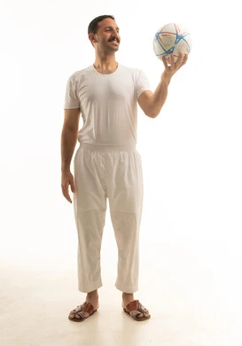 A Saudi Arabian Gulf man wearing a t-shirt and pants holding a soccer ball, cheering for the Saudi team, full body, white background. A Saudi Arabian Gulf man wearing a t-shirt and pants holding a soccer ball, cheering for the Saudi team, full body, white background.