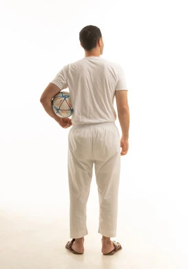 A Saudi Arabian Gulf man wearing a t-shirt and pants holding a soccer ball, cheering for the Saudi team, full body, white background. A Saudi Arabian Gulf man wearing a t-shirt and pants holding a soccer ball, cheering for the Saudi team, full body, white background.