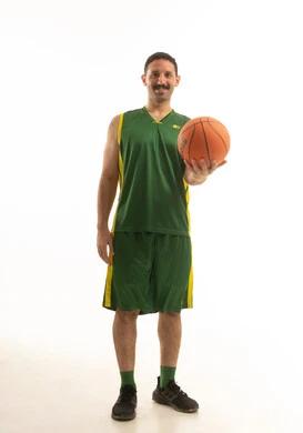 Saudi Basketball Player in Green Uniform on White