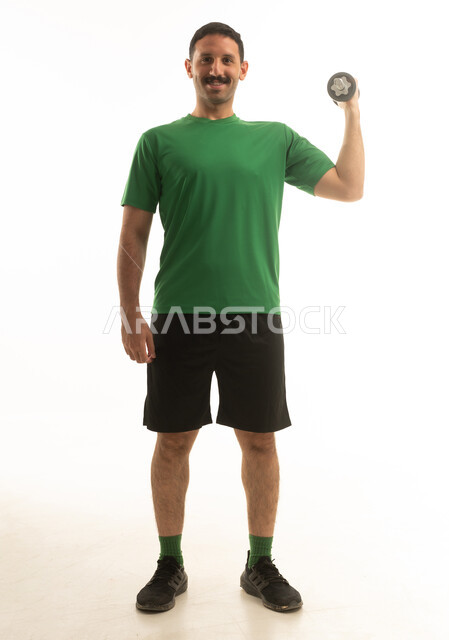 Saudi Man Fitness Dumbbell Workout Studio Portrait