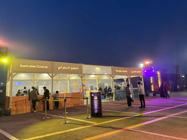 International and local cuisines at a food festival in the Ithra outdoor gardens in Dhahran, Eastern Province, Saudi Arabia, on December 28, 2025. Family-friendly and entertaining atmosphere, a recreational and educational experience, enjoyable outdoor seating.