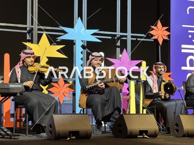 A musical and singing performance at a food festival in the Ithra outdoor gardens in Dhahran, Eastern Province, Saudi Arabia, on December 28, 2025. Family-friendly and entertaining atmosphere, international and local cuisines, an entertaining and educational experience, enjoyable outdoor seating, international and local food.