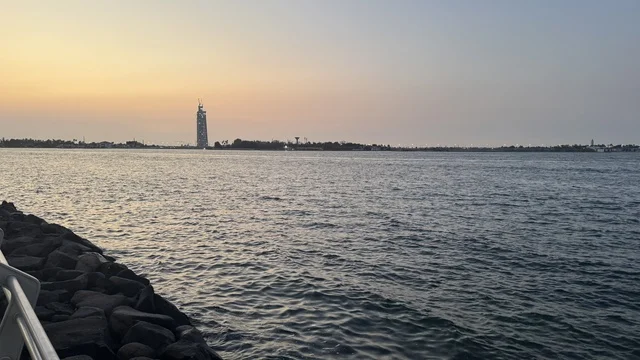 A tourist and recreational marine destination, the Abhur Corniche on the northern corniche of Jeddah, Saudi Arabia, features a coastal promenade with open views of the Red Sea, restaurants and cafes overlooking the waterfront, various recreational activities, and a calm and unique family atmosphere.