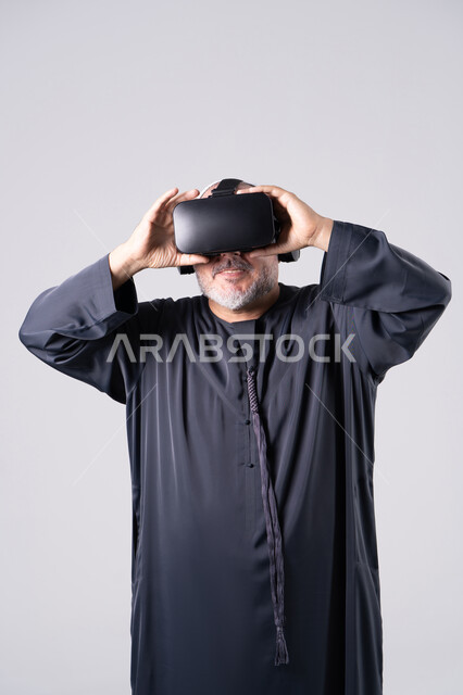 Emirati Man Using Virtual Reality Headset in Studio