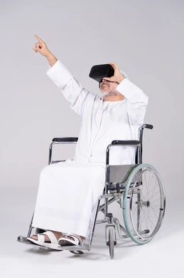 Emirati Man in Wheelchair Using VR Headset