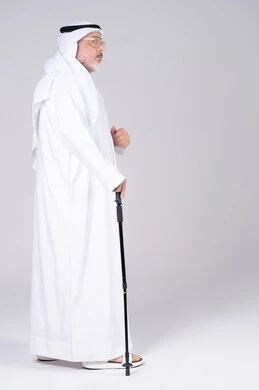 Senior Emirati Man with Walking Cane in Studio