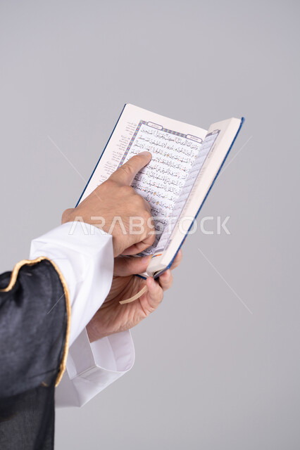 Emirati Man Reading Holy Quran Close-up