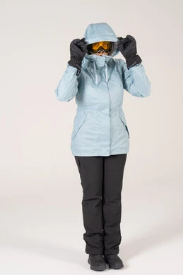 Woman in Winter Ski Gear on White Background