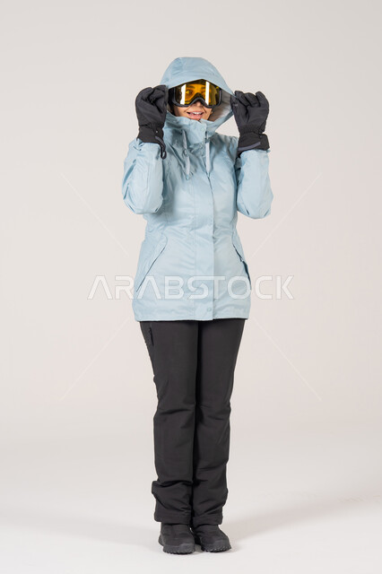 Woman in Ski Gear and Blue Winter Jacket