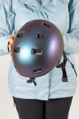 Person Holding Iridescent Bicycle Safety Helmet