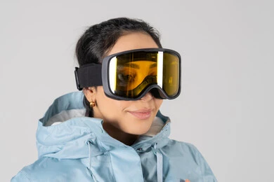 Saudi Woman in Blue Winter Jacket and Ski Goggles Saudi Woman in Blue Winter Jacket and Ski Goggles