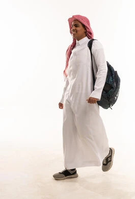 Saudi Student Walking with Backpack on White Background