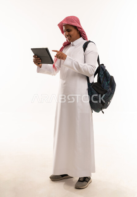 Saudi Student with Tablet and Backpack on White Background