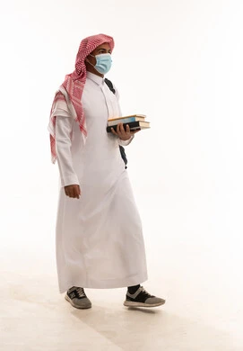 Saudi Student in Mask Carrying Books on White Background