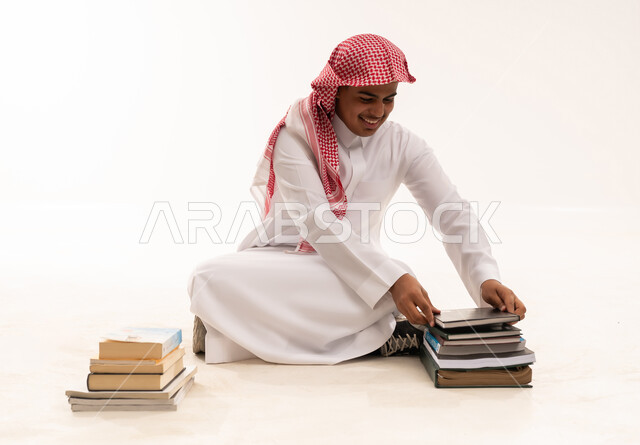 Saudi Student with Books on White Background