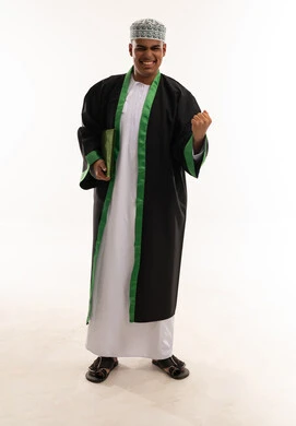 Omani Man in Traditional Bisht Celebrating Success