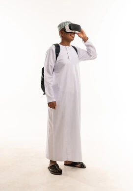 Omani Man Wearing VR Headset on White Background