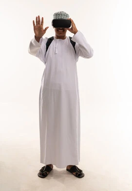 Omani Man Wearing VR Headset on White Background